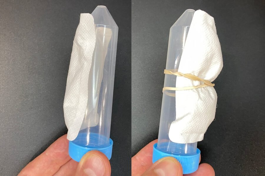testclear powdered urine bottle with hand warmers attached